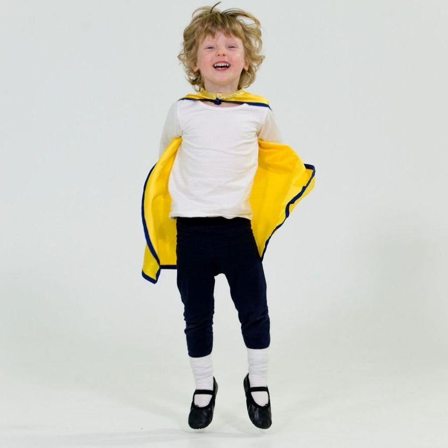 Master William jumping high with delight, happy to be dancing with his Little Ballet Dancer cape